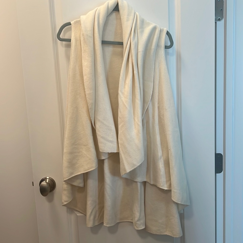 Ivory sweater vest by Moth/ Anthropologie. One size fits all.